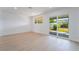 Dining area featuring light wood flooring, sliding doors to outdoor space and an abundance of natural light at 343 W Basic Rd, Henderson, NV 89015