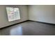 Bright bedroom featuring modern flooring, neutral walls, and plenty of natural light at 3453 Del Marino Dr, Las Vegas, NV 89121