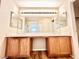 Bright bathroom featuring double sinks with spacious countertop and vanity at 3542 Harbor Tides St, Las Vegas, NV 89147