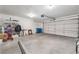 Spacious garage with storage and a multi-panel garage door at 3629 Laguna Verde Way, Las Vegas, NV 89121