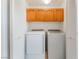 Laundry room featuring cabinetry, washer and dryer at 3629 Laguna Verde Way, Las Vegas, NV 89121