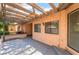 Large covered patio with wood pergola offering shade and privacy at 3629 Laguna Verde Way, Las Vegas, NV 89121