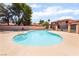 Inviting community pool with lounge chairs and landscaped surroundings at 3629 Laguna Verde Way, Las Vegas, NV 89121