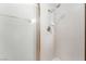 Modern shower featuring white tiled walls and adjustable shower head at 3629 Laguna Verde Way, Las Vegas, NV 89121