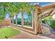 The backyard has a well-kept lawn and sizable windows that let in plenty of natural light at 3741 Via Gaetano, Henderson, NV 89052