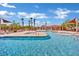 Resort-style community pool with ample seating, palm trees, and a clubhouse for upscale outdoor living at 3741 Via Gaetano, Henderson, NV 89052