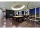 Elegant game room featuring a billiard table, hardwood floors, and expansive windows showcasing city views at 3750 S Las Vegas Blvd # 4507, Las Vegas, NV 89158