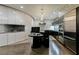 Modern kitchen features dark cabinets, stainless steel appliances, and sleek, curved counters at 3750 S Las Vegas Blvd # 4507, Las Vegas, NV 89158