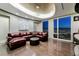 Comfortable living room with leather sectional sofa, city views, and modern finishes at 3750 S Las Vegas Blvd # 4507, Las Vegas, NV 89158