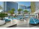 Resort-style pool area with modern lounge chairs, umbrellas, and landscaped surroundings at 3750 S Las Vegas Blvd # 4507, Las Vegas, NV 89158