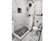 Stylish bathroom with glass shower, rainfall shower head, and modern fixtures at 4492 Rita Dr, Las Vegas, NV 89121