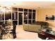 Bright, open space with floor to ceiling windows, dining area and sleek modern furniture at 4575 Dean Martin Dr # 303, Las Vegas, NV 89103