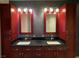 Bathroom featuring and vanities, modern fixtures, and black countertops at 4575 Dean Martin Dr # 705, Las Vegas, NV 89103