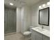 Well-lit bathroom featuring a glass-enclosed shower and a modern vanity with a sink at 4575 Dean Martin Dr # 705, Las Vegas, NV 89103