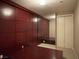 Bedroom with built-in platform bed and wall-to-wall storage cabinet at 4575 Dean Martin Dr # 705, Las Vegas, NV 89103