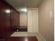 Bedroom with built-in platform bed and wall-to-wall storage cabinet at 4575 Dean Martin Dr # 705, Las Vegas, NV 89103