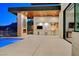 The pool, spa, outdoor kitchen, and living space is great for entertaining at 49 Crested Cloud Way, Las Vegas, NV 89135