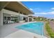 Enjoy this sparkling private pool with access from the great room and outdoor kitchen, as well as great backyard views at 49 Crested Cloud Way, Las Vegas, NV 89135