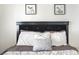 Stylish bedroom featuring black headboard with white, grey, and black bedding at 4955 Jeffreys St # 605, Las Vegas, NV 89119