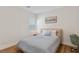 Cozy bedroom with natural light, a comfortable bed, and stylish decor at 5081 Notting Hill Ave, Las Vegas, NV 89139