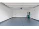 Spacious and clean two car garage with epoxy floors and ample storage space at 5081 Notting Hill Ave, Las Vegas, NV 89139