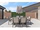 Outdoor dining set with seating for six is ideal for enjoying meals outdoors at 5081 Notting Hill Ave, Las Vegas, NV 89139
