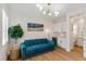 Cozy sitting room with hardwood floors, stylish furniture, and a convenient wet bar at 5081 Notting Hill Ave, Las Vegas, NV 89139