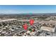Aerial view of a modern home in a residential area, showcasing its location and surroundings at 6235 N Fort Apache Rd, Las Vegas, NV 89149