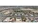 Expansive aerial view of a neighborhood with diverse homes and landscapes at 6235 N Fort Apache Rd, Las Vegas, NV 89149