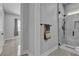 Modern bathroom with glass-enclosed shower and contemporary fixtures at 6235 N Fort Apache Rd, Las Vegas, NV 89149