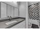 Bathroom features modern vanity with a large mirror, and a decorative shower at 6235 N Fort Apache Rd, Las Vegas, NV 89149