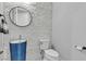 Stylish powder bathroom with accent wall and modern vessel sink at 6235 N Fort Apache Rd, Las Vegas, NV 89149