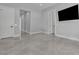 Spacious bedroom with recessed lighting, tiled floors, and a television at 6235 N Fort Apache Rd, Las Vegas, NV 89149