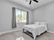Cozy bedroom with tiled floors, a simple bed frame, and a window at 6235 N Fort Apache Rd, Las Vegas, NV 89149