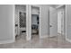 Bedroom provides access to the bathroom and closet with hanging clothes at 6235 N Fort Apache Rd, Las Vegas, NV 89149