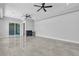 Bright bedroom featuring tile floors, recessed lights, and sliding glass doors to the backyard at 6235 N Fort Apache Rd, Las Vegas, NV 89149