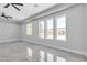 Bright empty room featuring large windows at 6235 N Fort Apache Rd, Las Vegas, NV 89149