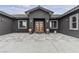Elegant entryway features modern doors, clean lines, and neutral color palettes at 6235 N Fort Apache Rd, Las Vegas, NV 89149