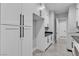 Large laundry room featuring ample cabinet and counter space at 6235 N Fort Apache Rd, Las Vegas, NV 89149