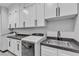 Laundry space featuring sink and modern machines at 6235 N Fort Apache Rd, Las Vegas, NV 89149