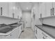 Spacious laundry room with lots of cabinet space and machines at 6235 N Fort Apache Rd, Las Vegas, NV 89149