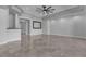 Bright living room with tile floors, recessed lighting, and contemporary design at 6235 N Fort Apache Rd, Las Vegas, NV 89149