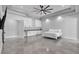Expansive main bedroom featuring grey cabinets, fan, and tiled floors at 6235 N Fort Apache Rd, Las Vegas, NV 89149