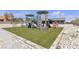 Backyard playground area with artificial turf and play structure at 6235 N Fort Apache Rd, Las Vegas, NV 89149