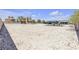 Expansive undeveloped lot, featuring a playground, with room to customize your dream property at 6235 N Fort Apache Rd, Las Vegas, NV 89149