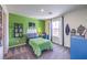 Bright bedroom featuring cool skateboard decor, work area, window and closet at 7437 Cooper Cove Dr # 30, North Las Vegas, NV 89084