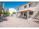 Spacious backyard featuring a covered patio, perfect for outdoor dining and entertaining at 7820 Esteem St, Las Vegas, NV 89131