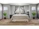 Bright bedroom with large windows, neutral walls, and ample space at 7820 Esteem St, Las Vegas, NV 89131