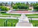 Community basketball court with lush green surroundings and benches for spectators at 7820 Esteem St, Las Vegas, NV 89131