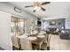 Cozy dining space connecting to the living room and kitchen with an open design at 7820 Esteem St, Las Vegas, NV 89131